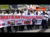 Taxi drivers protest over GrabCar service