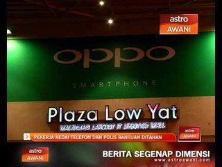 Pekerja kedai telefon dan polis bantuan ditahan