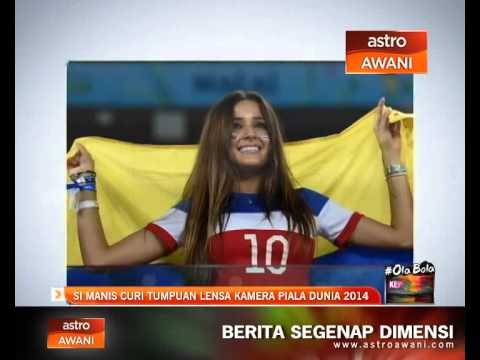 Si manis curi tumpuan lensa kamera Piala Dunia 2014