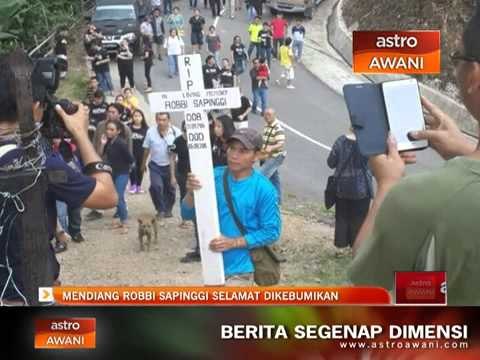 Mendiang Robbi Sapinggi selamat disemadikan