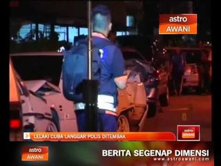 Download Video: Lelaki cuba langgar polis ditahan