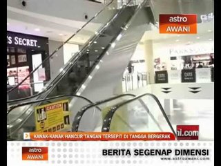 Kanak-kanak hancur tangan tersepit di tangga bergerak