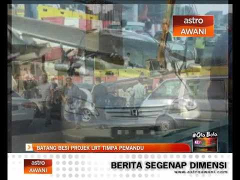 Pemandu nyaris maut, batang besi projek LRT timpa kereta