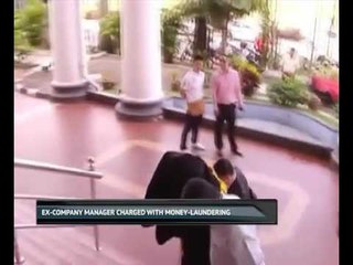Ex-company manager charged with money-laundering