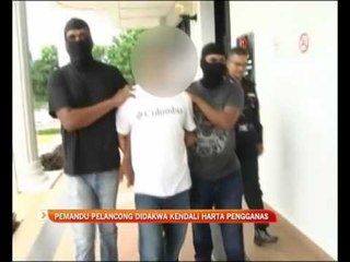 Pemandu pelancong didakwa kendali harta pengganas