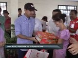 Johor Royals handover aid to flood victims