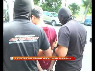 Jurulatih kayak didakwa kendali harta pengganas