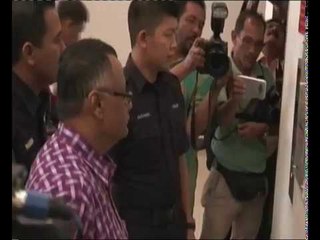 Cabinet minister's former aide claims trial to graft charges