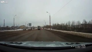 Dump truck gets cut off and drives off a bridge