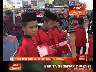 TESCO bawa anak yatim beli belah baju raya