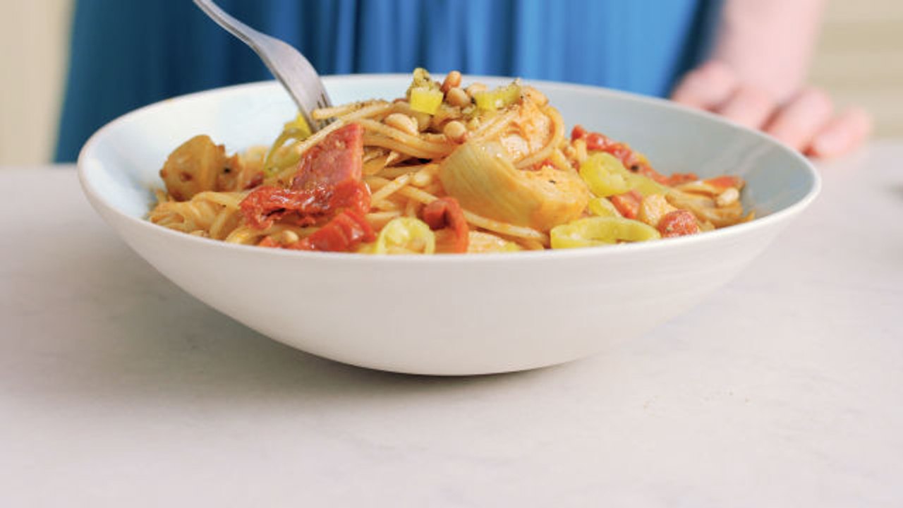 Antipasto Pasta with Sausage, Artichoke Hearts, and Sun-Dried Tomatoes