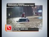 Banjir kilat: Pemandu terperangkap atas bumbung teksi