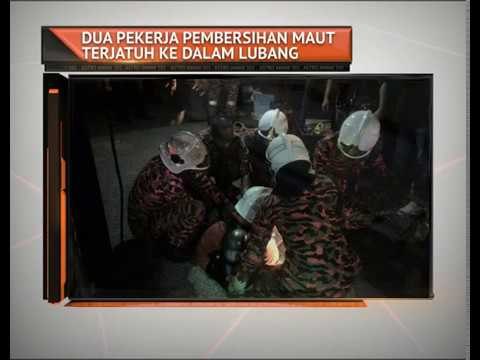 Dua pekerja pembersihan maut terjatuh ke dalam lubang
