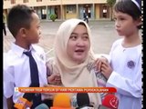Kembar tiga teruja di hari pertama persekolahan