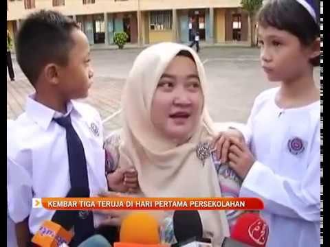 Kembar tiga teruja di hari pertama persekolahan