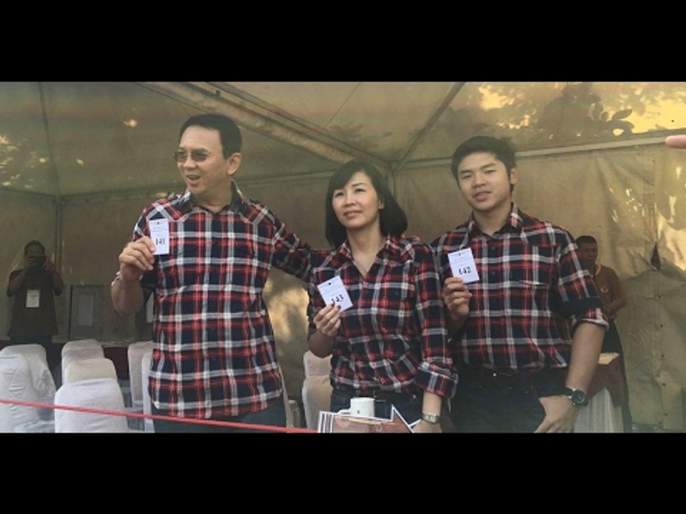 Ahok and family cast votes in Pluit