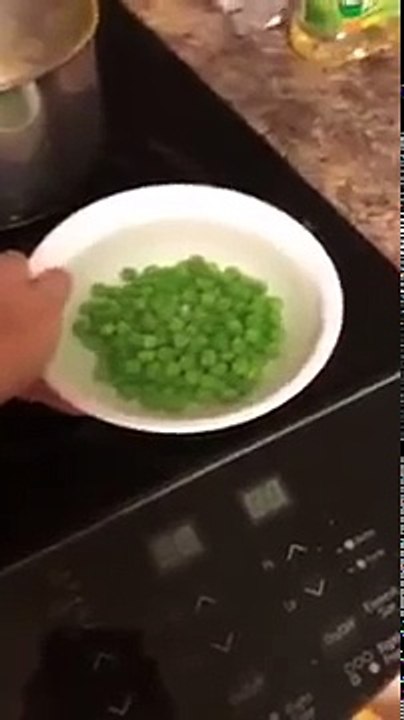 Duck eats peas really fast