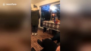 Drunk Batman falls backwards through open door at party