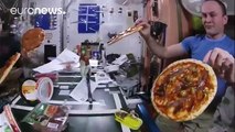 Watch: Italian astronaut Paolo Nespoli shares a pizza home with ISS crew