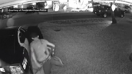 Man steals assault rifle from parked police car