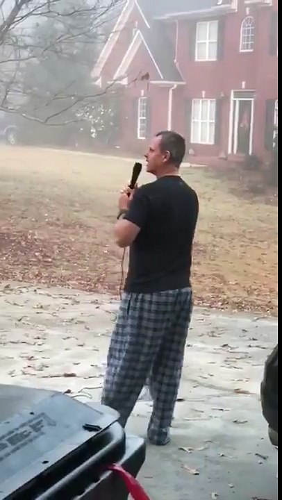 Georgia Bulldogs Fan Shouts at Neighbor