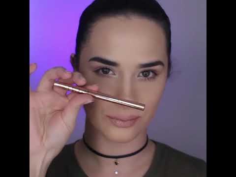 Women Demonstrates Cat Eyeliner Stencil
