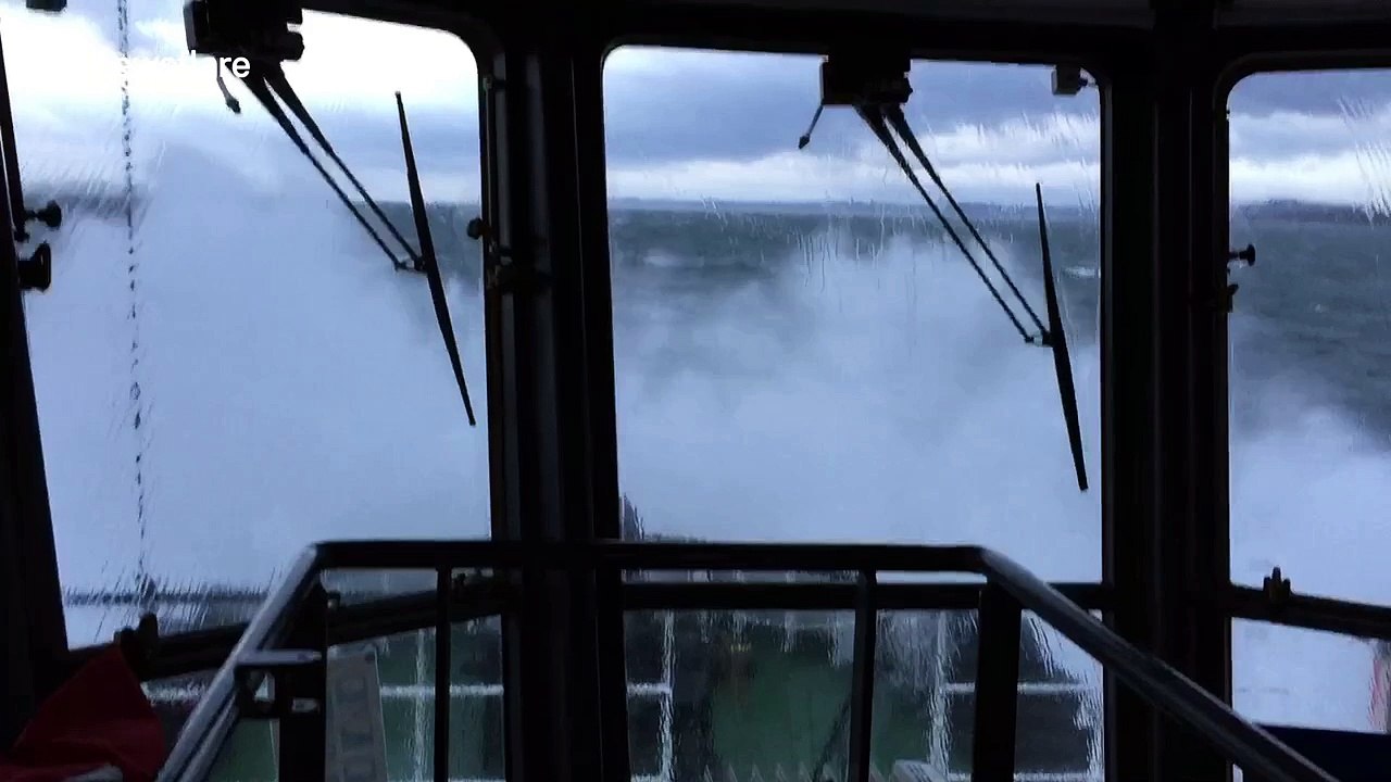 Tug powers into Storm Caroline's huge waves