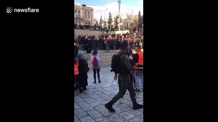 Protesters jeer Israeli soldiers at Jerusalem's Old City