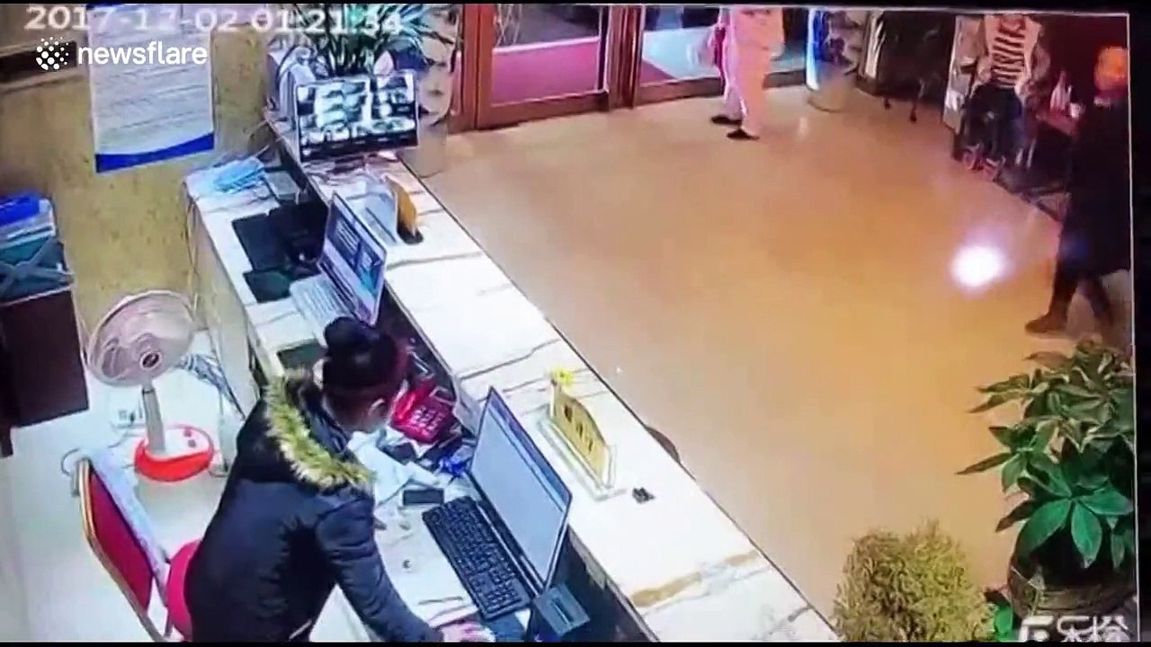 Man sprays hotel receptionist with extinguisher...