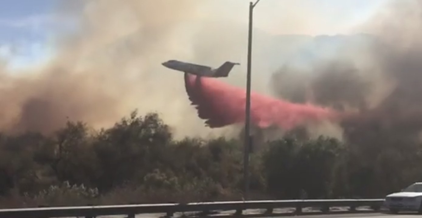 Fire Crews Work to Douse Wind-Fueled Lilac Fire