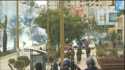 Israeli troops clash with Palestinian protesters in West Bank over Jerusalem decision