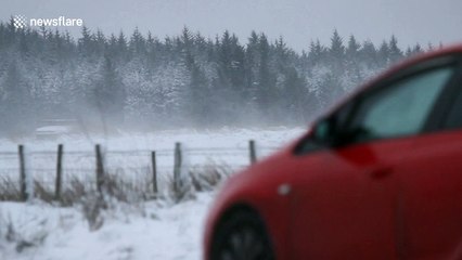 Commuters battle snow on Northern Ireland's Glenshane Pass