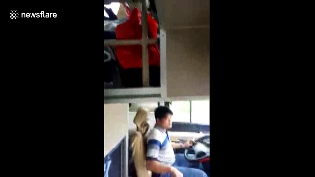 Coach driver caught dancing with both hands off wheel