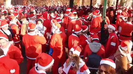 Thousands of Santas invade London for SantaCon 2017