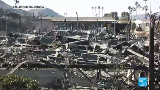 Firefighters make gains against California wildfires