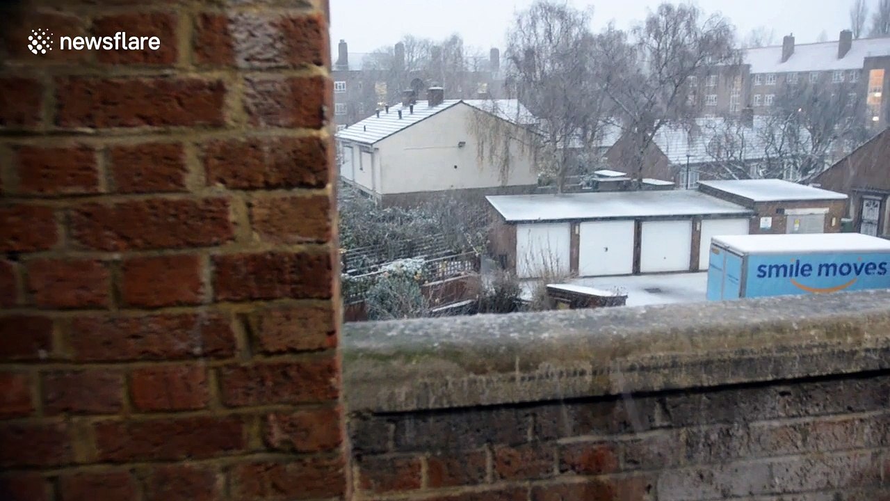 UK wakes up to heavy snowfall