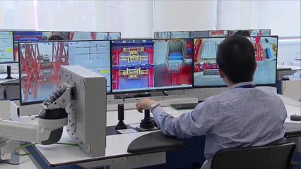 شاهد... أول ميناء آليّ عملاق يدار من برج مراقبة في شنغهاي