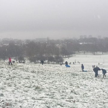 Londoners Enjoy Sunday Morning Snow on Primrose Hill