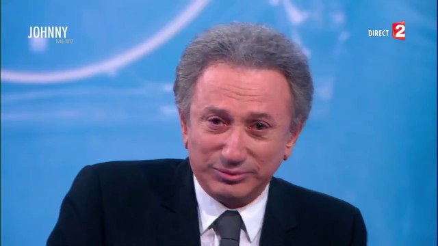 Michel Drucker ému aux larmes à la fin de l'émission hommage à Johnny Hallyday.