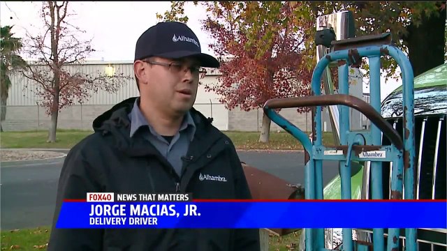Water Delivery Drivers Hailed as Heroes for Rescuing Family from House Fire