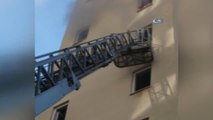 10 Katlı Binada Yangın Çıktı... Mahsur Kalanları İtfaiye Merdivenle Kurtardı