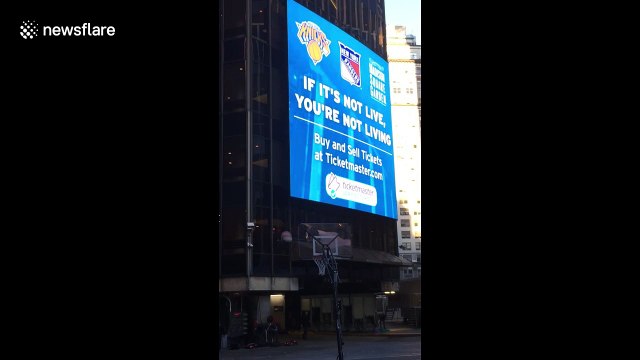 Harlem Globetrotter shoots hoops from top of Madison Square Garden