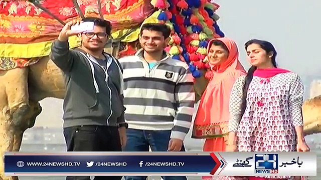 Karachiites Enjoying Pleasant Weather on Sea View..