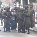 Blindfolded Boy Arrested by More than a Dozen Soldiers During Hebron During Protests