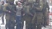 Blindfolded Boy Arrested by More than a Dozen Soldiers During Hebron During Protests