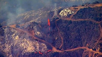 Wildfire in California forces thousands to flee their homes