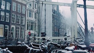 Amsterdam under the snow might be the best place to spend winter at..