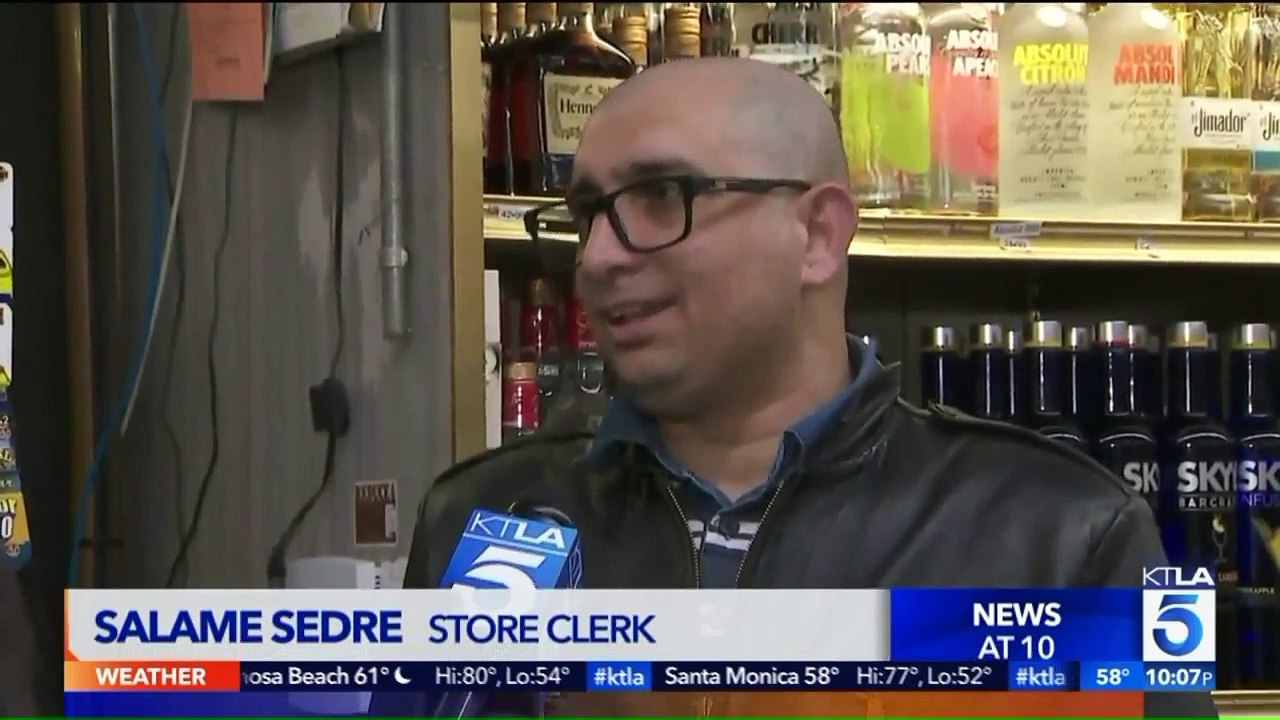 Video Shows Man Throwing Beer Cans at Liquor Store Clerk During Attempted Robbery