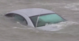 Car Abandoned on Slippery Wisconsin Road is Claimed by Lake Michigan