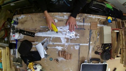 Reuben makes Ep3 paper to plastic stencil